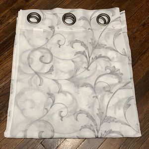 2 Silver floral semi-sheer curtains. 35x80